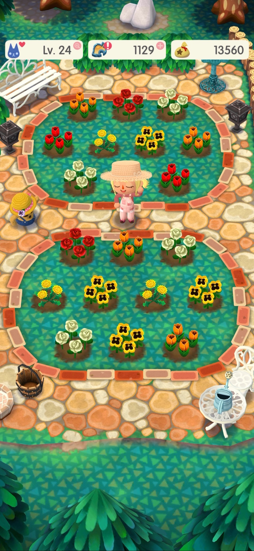 どうぶつの森 ポケットキャンプ コンプリート 花壇にたくさんの花を植えてキャンプ場を彩っている庭園エリアの様子